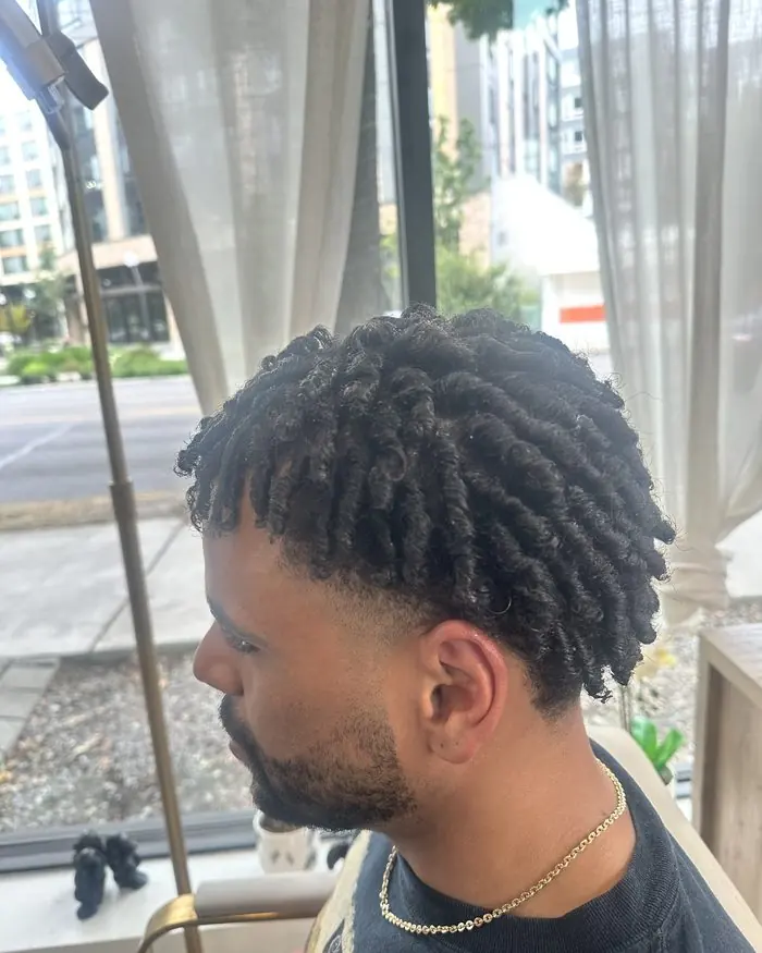 Men's locs freshly retwisted, profile view